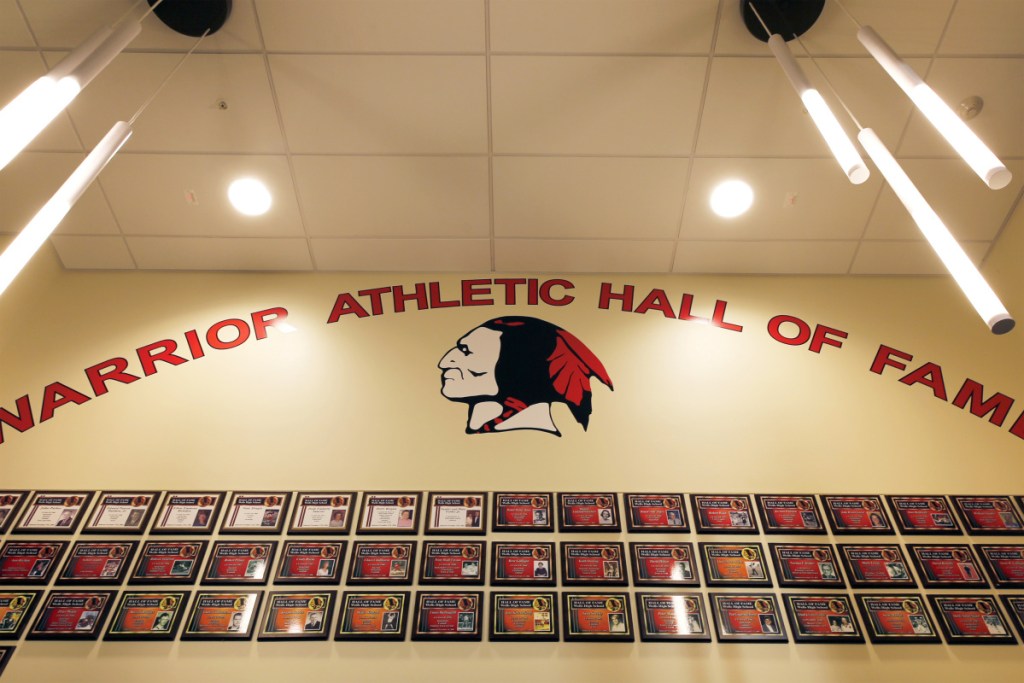 The foyer to Wells High School's athletic center prominently displays the school's mascot. The Wells-Ogunquit school committee voted Wednesday to remove Native American imagery from all schools in the district. Staff photo by Ben McCanna/Staff Photographer