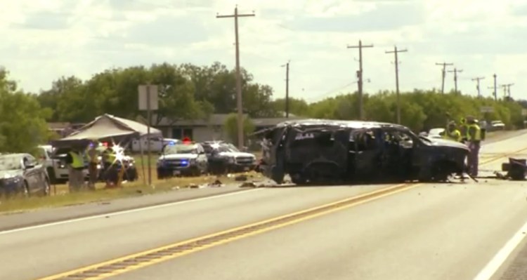 Video provided by KABB/WOAI in San Antonio shows the scene where authorities say at least five people were killed when an SUV carrying more than a dozen people crashed in Big Wells, Texas, while fleeing from Border Patrol agents.
