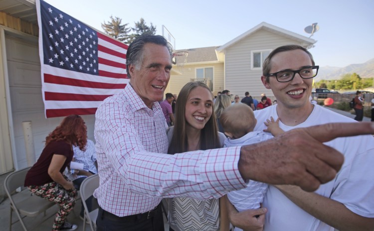 Mitt Romney makes a backyard campaign stop on Wednesday in American Fork, Utah. He's criss-crossing the state in a final push to impress voters before Tuesday, when he'll face state Rep. Mike Kennedy for a Republican U.S. Senate nomination.