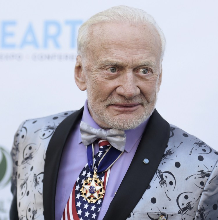 Buzz Aldrin is suing two of his children and a business manager, accusing them of misusing his credit cards.