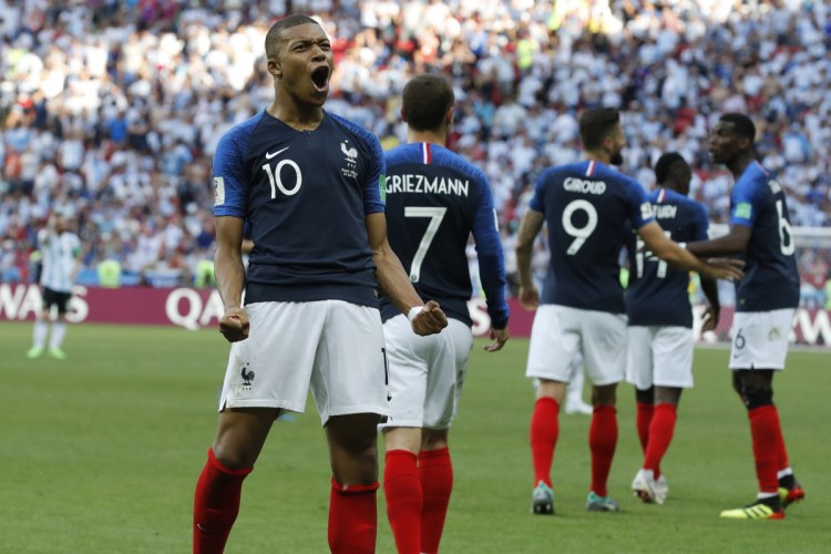 France's Kylian Mbappe celebrates after scoring his side's third goal during the elimination match between France and Argentina at the 2018 World Cup in Kazan, Russia on Saturday.