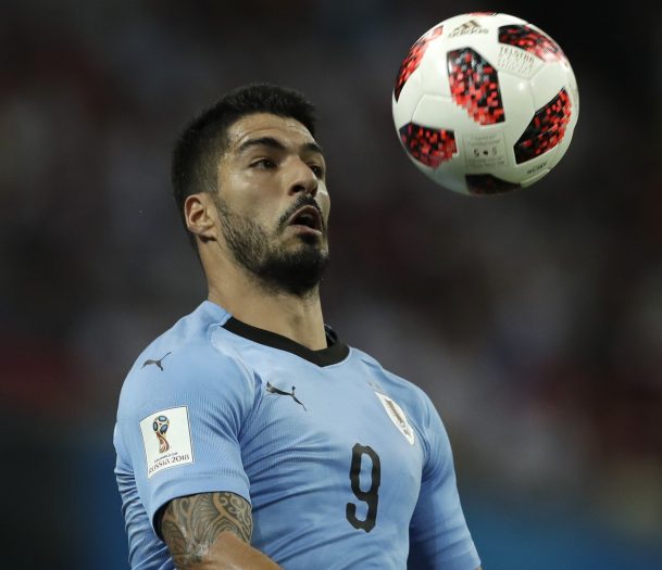 Uruguay's Luis Suarez controls the ball during Saturday's match with Portugal at Sochi, Russia. Uruguay won, 2-1.