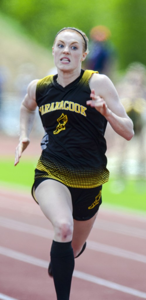 Staff photo by Joe Phelan 
 Maranacook's Janika Pakulski runs in the 100 meter dash during the Class C track and field state meet Saturday in Waterboro. Pakulski finished in 13.17 for second place.