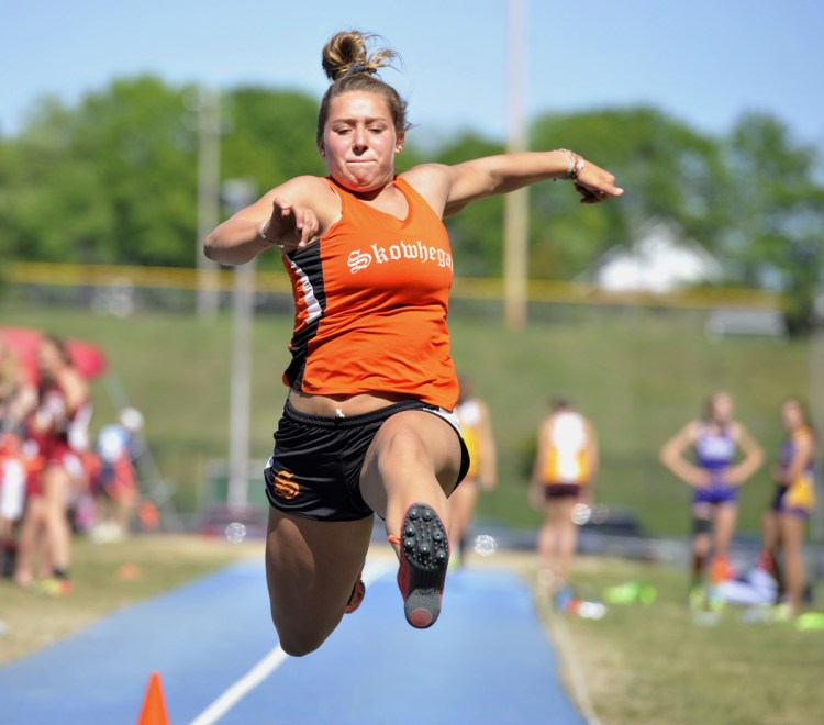 Skowhegan's Leah Savage competes in the girls triple jump event at the Class A track and field state championships Saturday in Bath.
