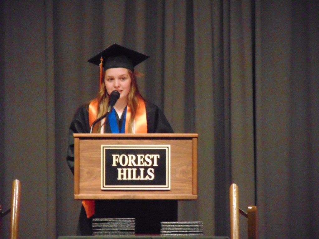 Demetria Giroux, the class's salutatorian, delivers her address Saturday during the Forest Hills graduation ceremony in Jackman. In an emotional speech, she told her 10 fellow graduates what they each have meant to her during their years together as a tight-knit class.