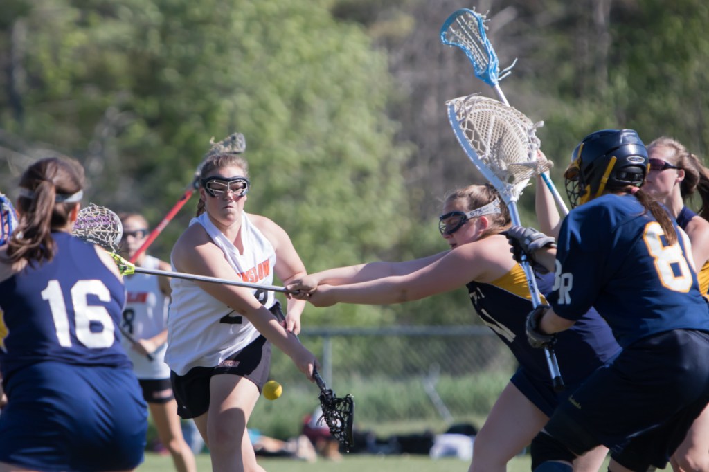 Winslow junior Hailey Grenier takes a shot on goal during the regular season finale against Boothbay on May 29 at Kennebec Savings Bank Field in Winslow.