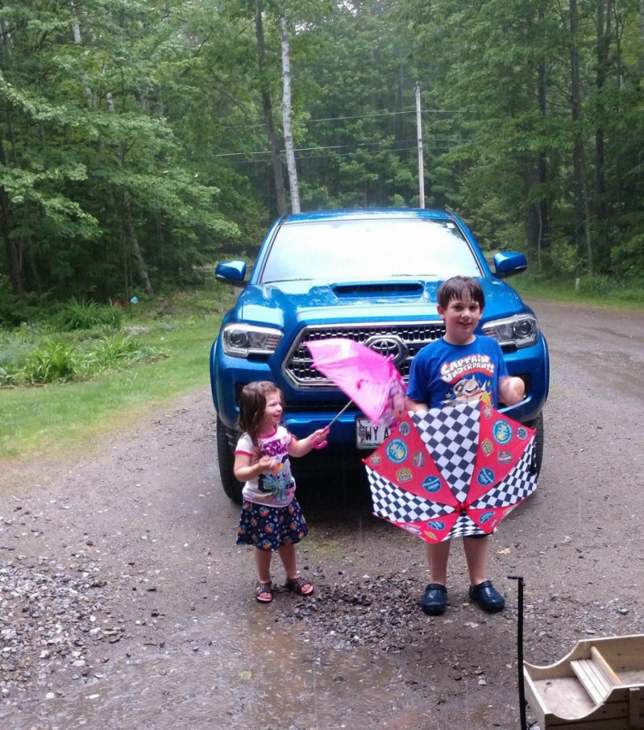 Mikaela Pollard, 2   and Wyatt Pollard, 7, enjoy a recent rainy day at the home of their grandparents' Chris and Janet Weeks, of Oakland. Their grandparents said Wyatt and Mikaela wouldn't let the rain stop them from having fun. Here they are singing and dancing in the down pour!