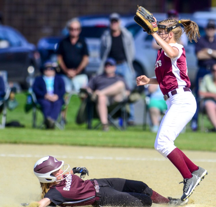 Buckfield baserunner Margaret Bragg was safe at second in front of Richmond shortstop Caitlin Kendrick during a Class D South semifinal game Friday at Richmond High School.