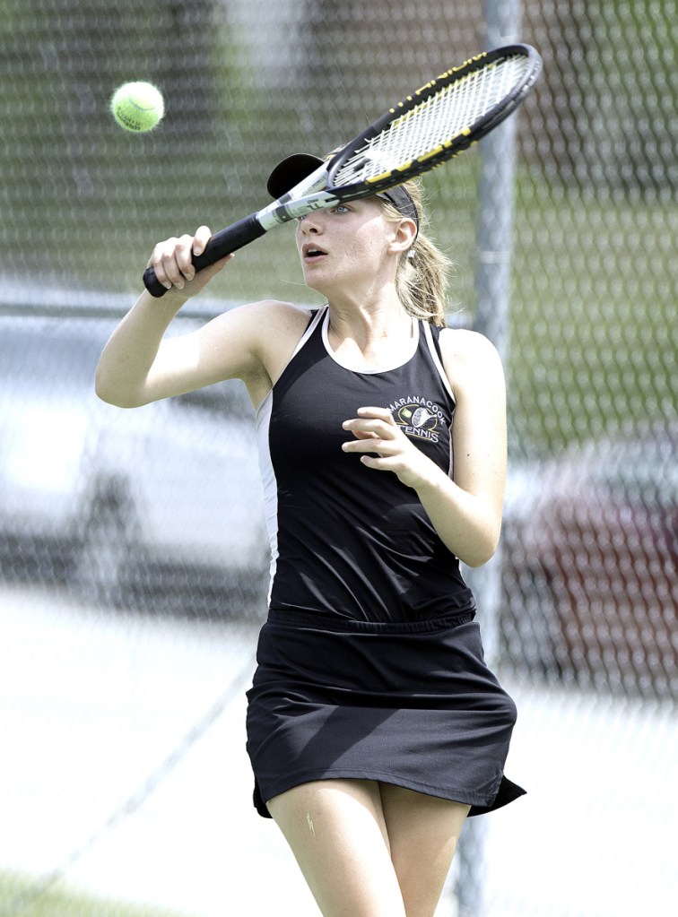 Maranacook No. 3 singles player Karissa Lucas returns a shot during her match in the Class C state championship Saturday in Lewiston.