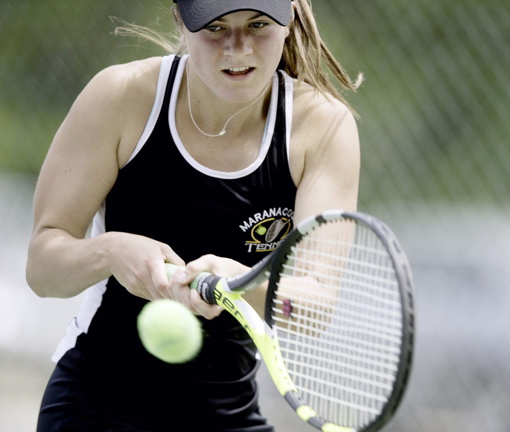Maranacook No. 1 singles player Madelyn Dwyer returns a shot during  the Class C state championship match against Mattanawcook on Saturday in Lewiston.