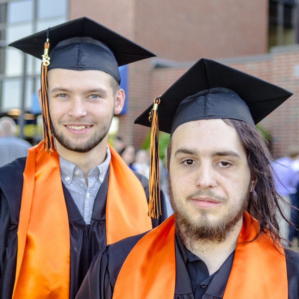 Gardiner seniors Charles Stevens, left, and Brandon Ware pose Saturday before the Gardiner Area High School graduation ceremony at the Augusta Civic Center.