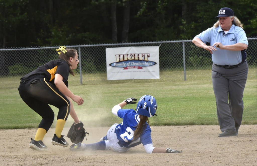 Maranacook shortstop Amanda Goucher looks to an umpire for a call after Madison baserunner Annie Worthen slides safely into second base during a Class C South quarterfinal game Thursday in Madison.