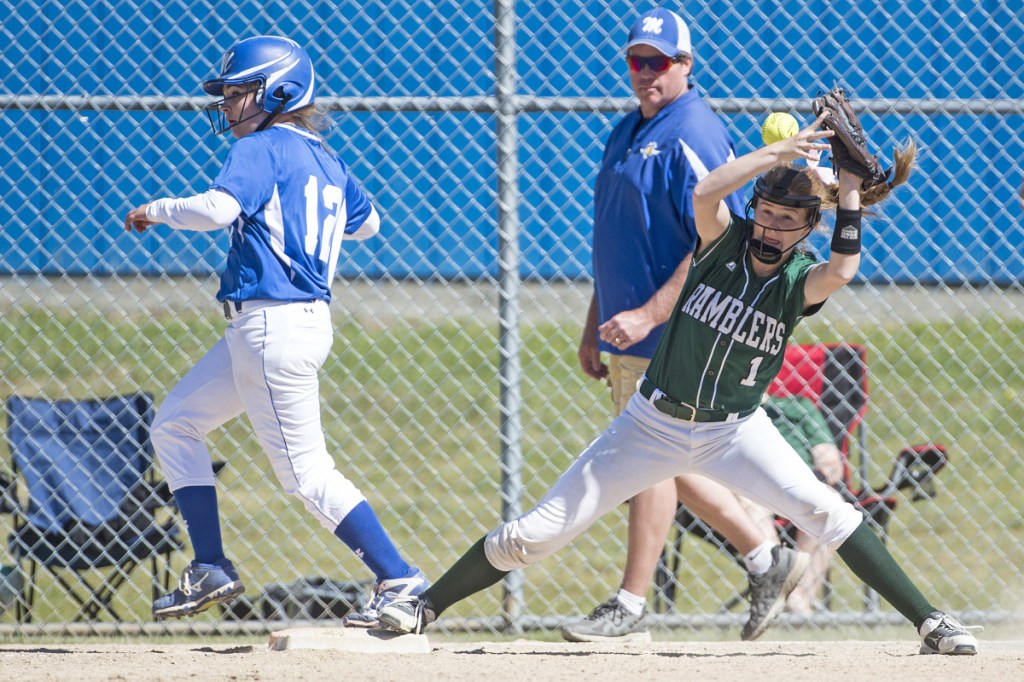 Winthrop's Bryanna Baxter (1) can't hold onto the the ball as Madison's Lauria LeBlanc (12) crosses the bag in the Class C South semifinals Saturday in Madison.