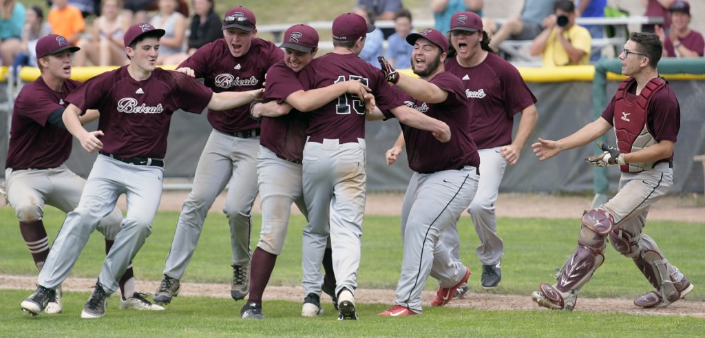 Richmond players celebrate defeating Searsport after a Class D South regional final game Wednesday in Standish.