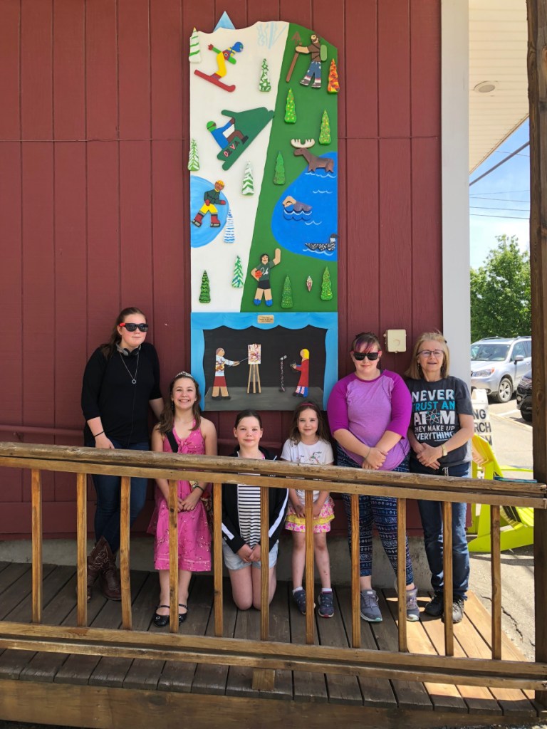 CASA students show their newly installed public art creation at the RFA Lakeside Theater in Rangeley. From left are Elizabeth Robare, Averie Flewelling, Olivia Therrien, Kate Therrien, Anna-Rose Ross and Valerie Zapolsky.