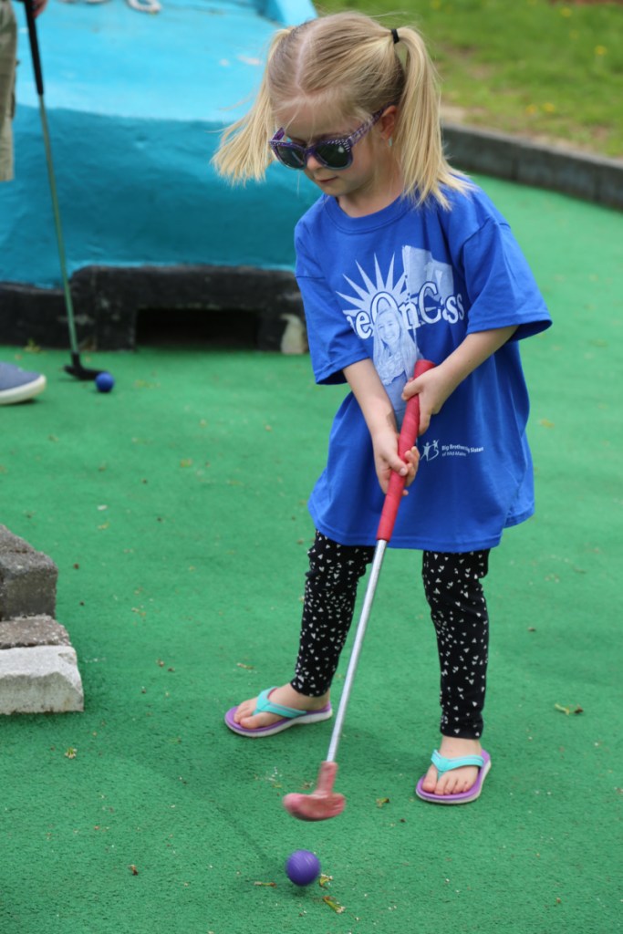 Peyton Belknap, takes her turn at Big Brothers Big Sisters of Mid-Maine's Putt 4 Cass event held May 19 at Gifford's Famous Ice Cream & Mini Golf..