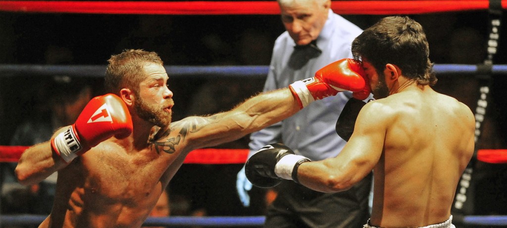 In this November 2013 photo, Brandon "The Cannon" Berry, of West Forks, fights Paul Souza, of Somerville, Massachusetts in the second round of a four-round professional junior welterweight fight at the Portland Expo. Berry will fight Carlos Galindo on Saturday in Gilford, New Hampshire.