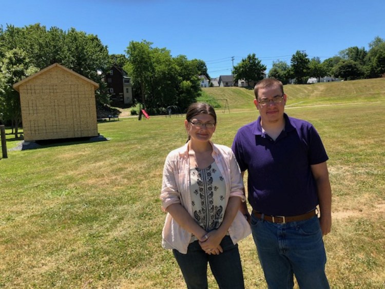 Jackie Dupont, chairwoman of the South End Neighborhood Association, and member Rien Finch lead a tour of Green Street Park on Friday. They hope to raise $20,000 to finish the first phase of the renovation of the park, which will include fitness stations.