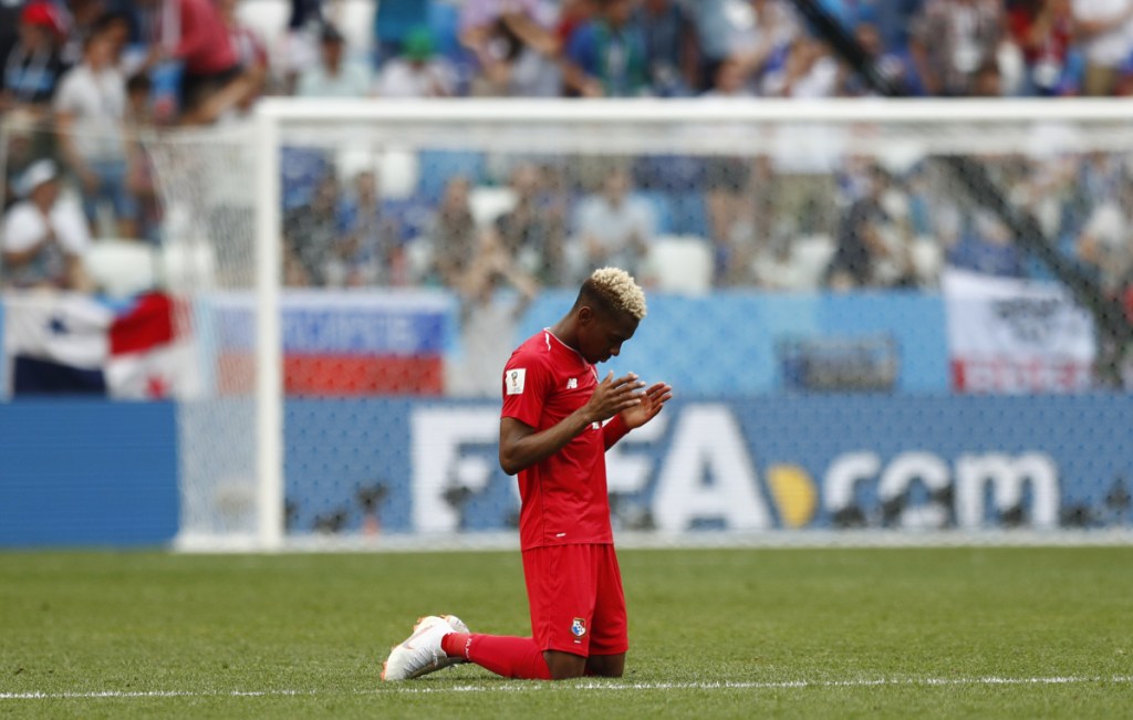 Panama's Michael Murillo kneels on the pitch following his team's 6-1 loss to England in their group G match at the 2018 World Cup on Sunday at the Nizhny Novgorod Stadium in Nizhny Novgorod, Russia. Panama qualified for the tournament and the United States did not.