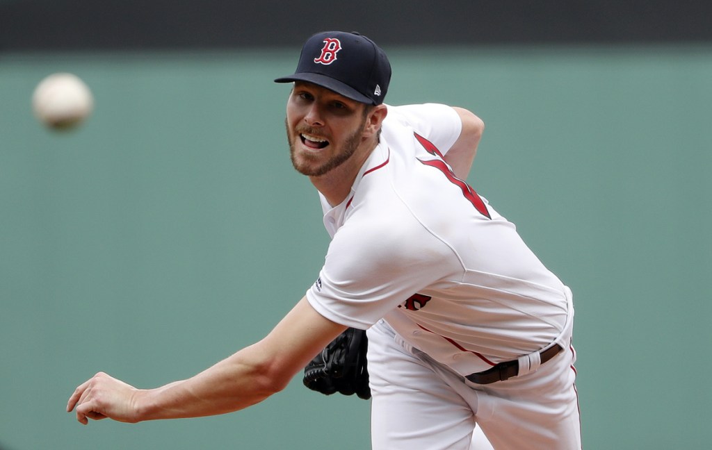Boston Red Sox starting pitcher Chris Sale pitched seven scoreless innings, striking out 13, walking one and allowing four hits in a 5-0 win over the Seattle Mariners on Sunday at Fenway Park in Boston.