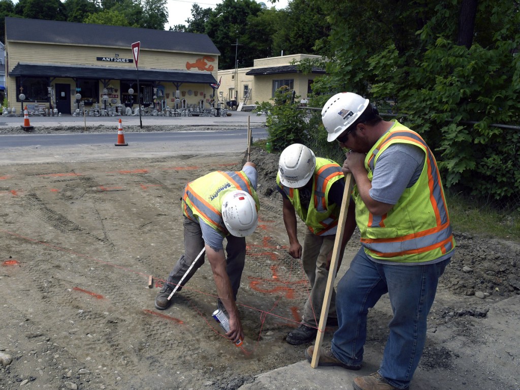 Sargent Corporation workers lay out the entrance to the Hallowell boat landing on Monday as park of the reconstruction of Route 201.
