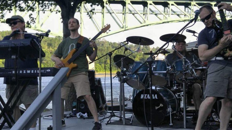 From left, Gerald Brann, Matt Howe, Kevin Ostrowski and Doug Huard perform a few years ago as the classic rock cover band Sundog.