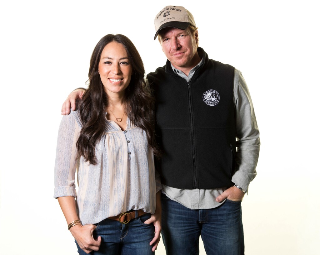 Joanna and Chip Gaines pose for a portrait in 2016 in New York to promote their home improvement show, "Fixer Upper," on HGTV. 