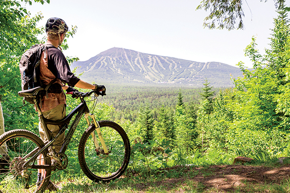 Western Maine offers spectacular views and outdoor challenges.  The Carrabassett Valley network of hiking and biking trails and the Sugarloaf Golf Club partner nicely with the many area festivals, road races and concerts planned for this summer.  Jamie Walter photo

