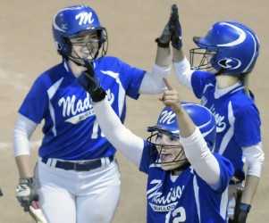 Marah Hall, left, Lauria LeBlanc, foreground, and Whitney Bess celebrate during the Class C South championship game against Sacopee Valley on Tuesday night in Standish.