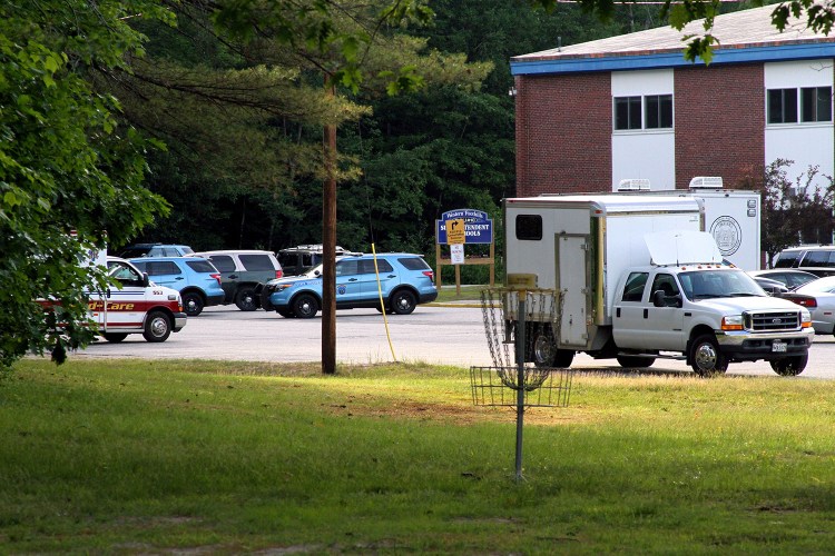 Police were using Mountain Valley High School in Rumford as a staging area Friday as they searched for a suspect in the killing of a woman in Berlin, N.H.