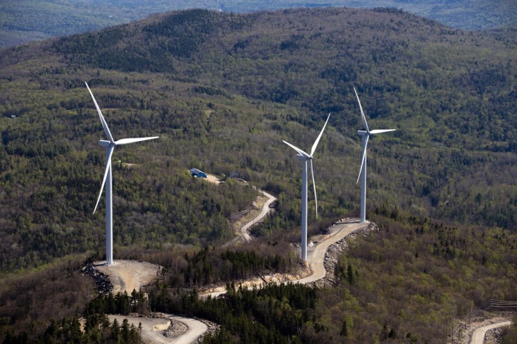 Three wind turbines are seen atop a ridge just south of Webb Lake in this aerial photograph taken in 2015.