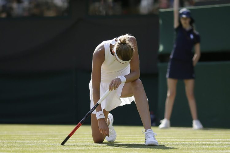 Petra Kvitova, a two-time champion at Wimbledon, was knocked out of the tournament in the first round on Monday, losing to unseeded Aliaksandra Sasnovich.