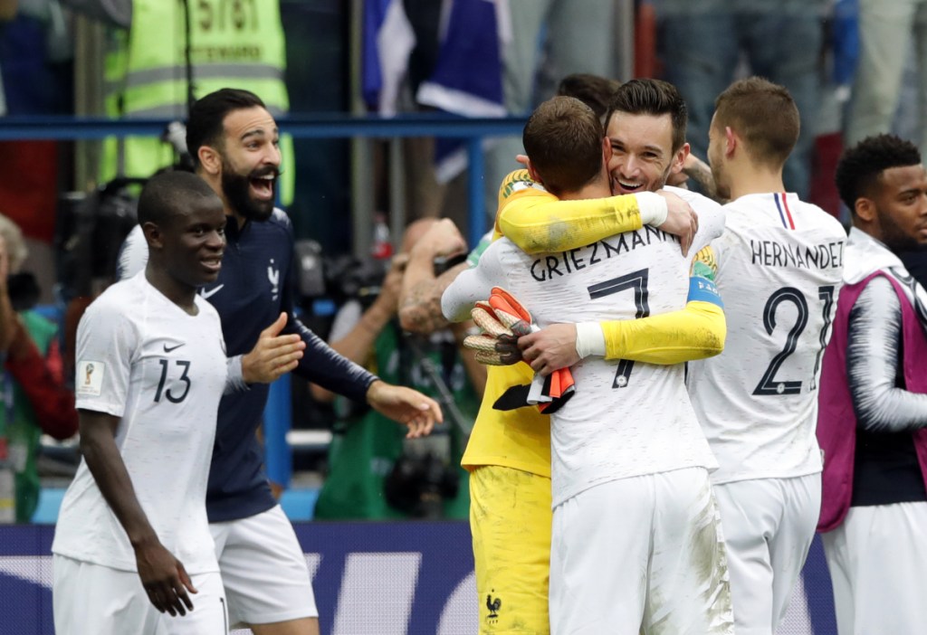 French players celebrate at the end of their quarterfinal match against Uruguay in Nizhny Novgorod, Russia, on Friday. (AP Photo/Ricardo Mazalan)