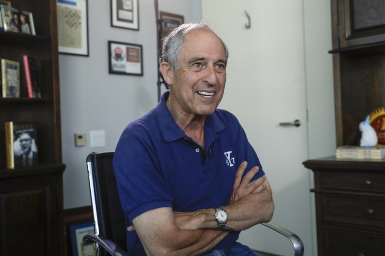 Attorney Lanny Davis speaks during a 2018 interview in his K Street office in Washington. Donald Trump's longtime personal lawyer and fixer Michael Cohen has added Davis, a former attorney for Bill Clinton, Martha Stewart and Jerry Sanduksy, to his legal team.