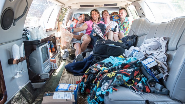 Jamming into the back seat of their newly purchased limo at Shaker Hill Outdoors in Poland, the four friends prepare to set out on a 48-state road trip in the hope of getting to meet Ellen DeGeneres. From left are David Sosna, Ty Gatewood, Jake Triplett and Kyle Brown.
