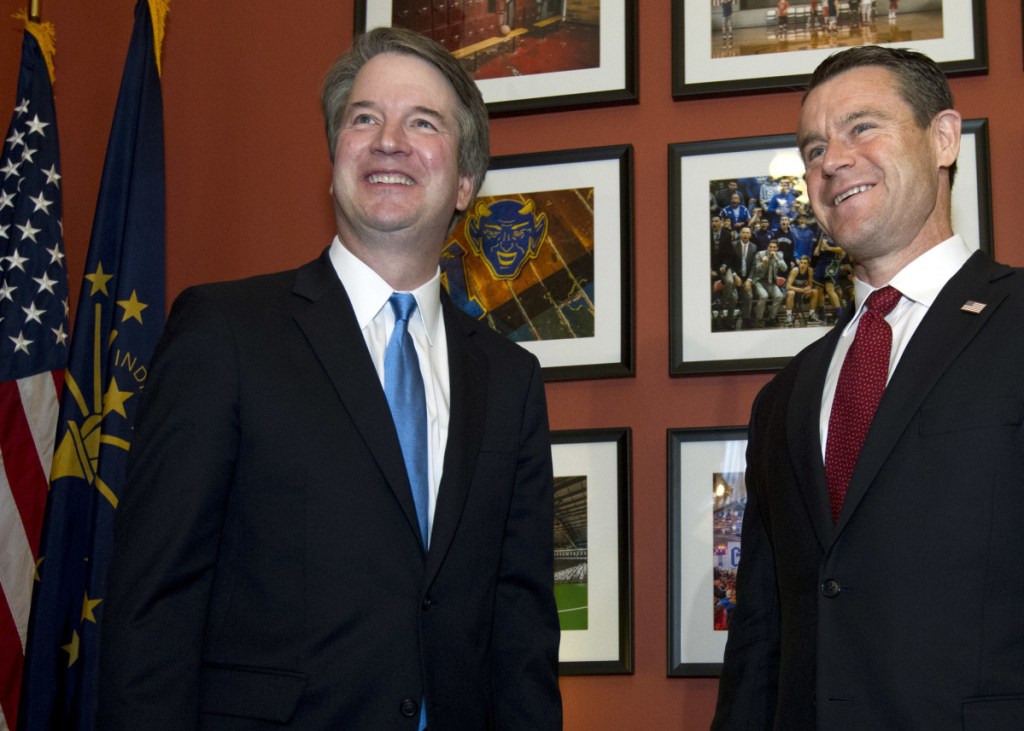 Supreme Court nominee Judge Brett Kavanaugh, left, meets with Sen. Todd Young, R-Ind., on Tuesday.