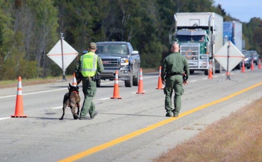 U.S. Border Patrol agents operate a citizenship checkpoint in June along Interstate 95 between the Penobscot County towns of Howland and Lincoln.