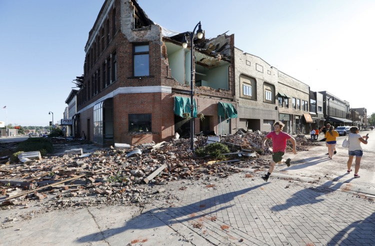Main Street of  Marshalltown, Iowa on Thursday. Several buildings were damaged by a tornado in the main business district in town including the historic courthouse.