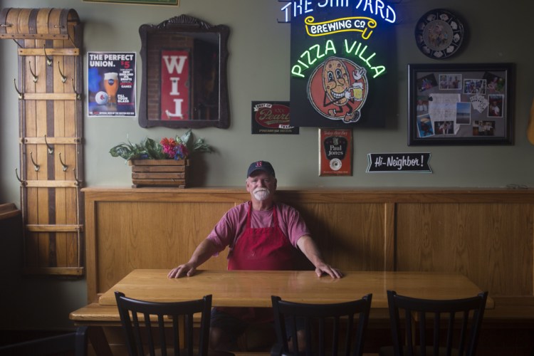 Phil Regios, above, and his brother Tony plan to retire after selling the building housing the Pizza Villa restaurant to Maine Med, scheduled to be finalized next March. The Congress Street institution was opened by Regios' father, Mike, in 1965, and Regios took it over in 1975.