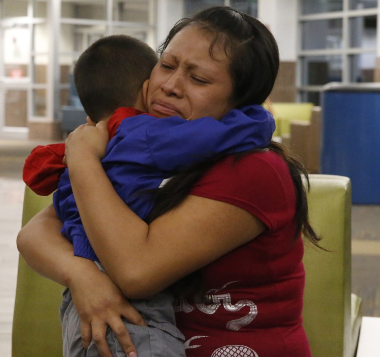 A mother and son separated for six weeks reunite at a Texas airport Thursday. A judge cites "persistent problems" at places where kids are held.