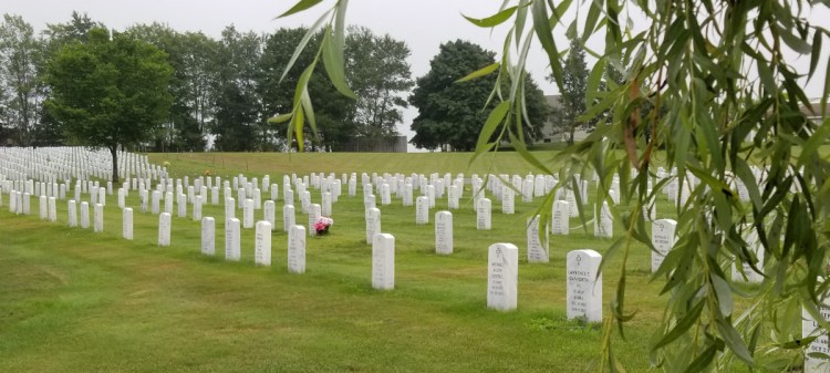 Headstones at the Maine Veterans Memorial Cemetery on Mount Vernon Road in Augusta. Cemetery officials say they get about 10 inquiries a month about the possibility of green burials.
