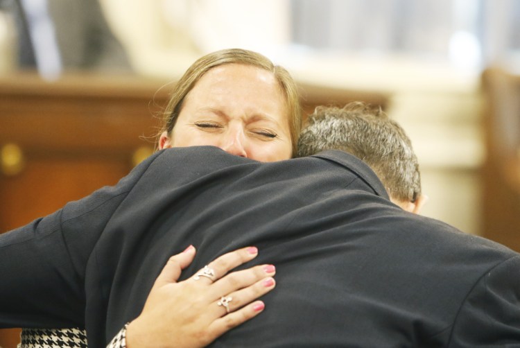 Jill Lamontagne hugs defense attorney Scott Gardner after being found not guilty by a jury at York County Superior Court on July 26. 