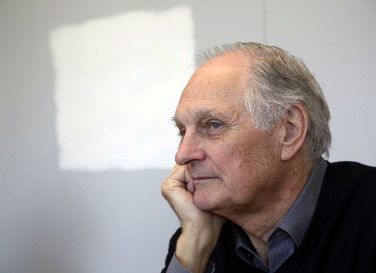 Actor Alan Alda listens during an interview at Stony Brook University, on New York's Long Island in 2013.  Alda, appearing on "CBS This Morning," said he was diagnosed with Parkinson's disease three and a half years ago.