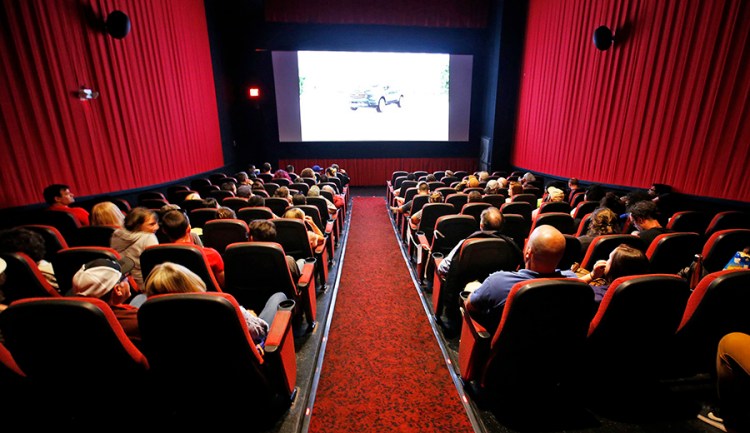 The audience settles in for the 4:20 p.m. showing of "Sorry to Bother You" at Nickelodeon Cinemas on Saturday. About 80 people claimed free seats out of 124 available. Another 15 seats were reserved for friends and family of the Ferreiras.