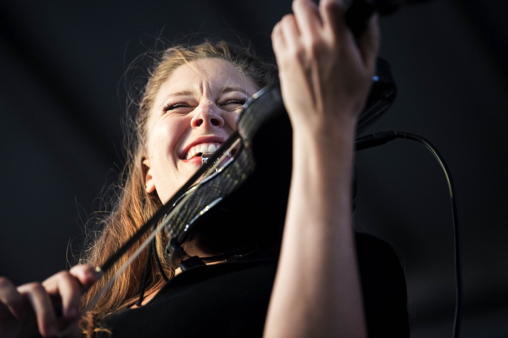 Corinna Smith, violinist for the Adam Ezra Group, performs with the group Friday at the kickoff concert of the Waterville Rocks! summer concert series at Castonguay Square in downtown Waterville.