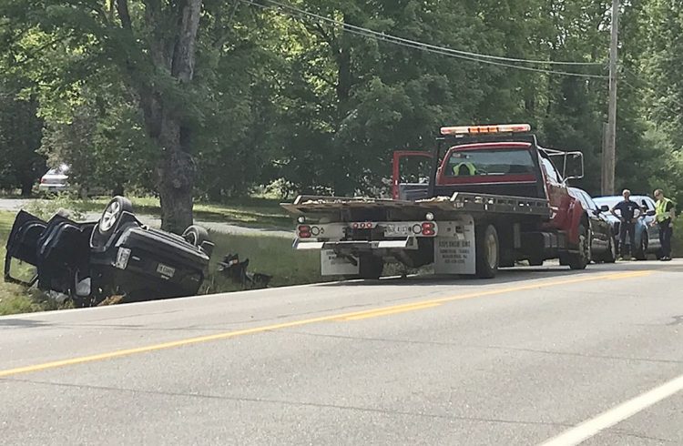 A Jeep Patriot sport utility vehicle crashed Wednesday morning on the side of Route 27 in Pittston, sending three to the hospital. Maine State Police say distracted driving caused the crash.