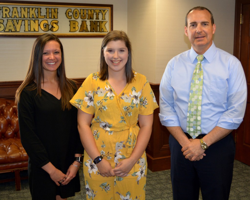 The Mt Abram High School scholarship was awarded to Emma Berube, center, with Franklin Savings Bank's Courtney Austin, left, and FSB President Tim Thompson.