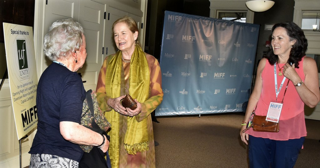 Actress Dominique Sanda, center, chats with Jean Bird, left, of Waterville after arriving  at the Waterville Opera House where she was awarded the Maine International Film Festival Lifetime Achievement award after a viewing of her film "The Garden of the Finzi-Continis" on Sunday. Accompanying Sanda at right is Arlene King-Lovelace of MIFF.