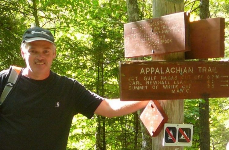 Director of the University of Maine at Farmington Fitness and Recreation Center Jim Toner stands at a crossroads recently along the Appalachian Trail. Toner, of New Vineyard, died Monday, almost one year after he was diagnosed with gall bladder or bile duct cancer.