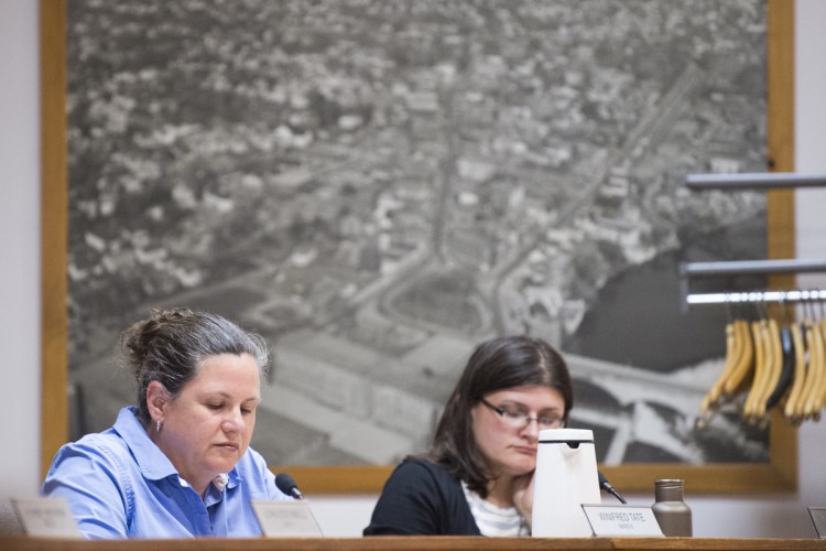 Ward 6 Councilor Winnifred Tate, left, and Ward 7 Councilor Jackie Dupont listen Tuesday during a City Council meeting at The Center in Waterville.